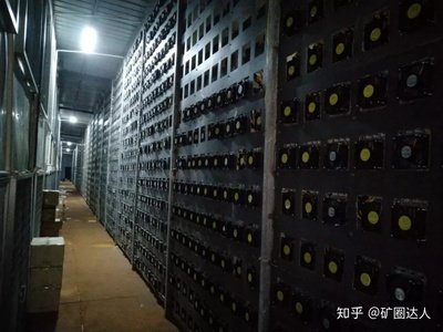 Bitcoin mining farm with rows of ASIC miners operating
