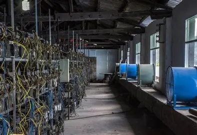 A bustling mining farm facility, showcasing the secure and efficient hosting environment for cryptocurrency miners