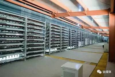 A sprawling mining farm illuminated by arrayed lights showcasing continuous mining operations